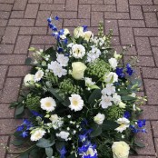 Royal In White Coffin Spray.